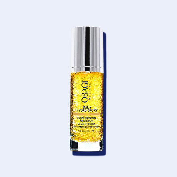 Obagi Daily Hydro-Drops Facial Serum 30ml bottle with golden-yellow hydrating liquid and metallic silver cap