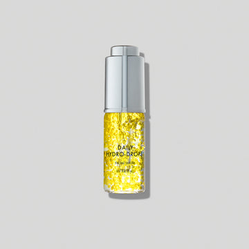 Obagi Daily Hydro-Drops Facial Serum deluxe sample with pump dispenser in golden-yellow liquid