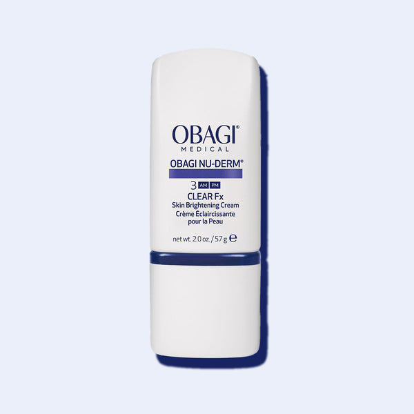 Obagi Nu-Derm Clear Fx skin brightening cream 2oz bottle with white jar and navy blue packaging